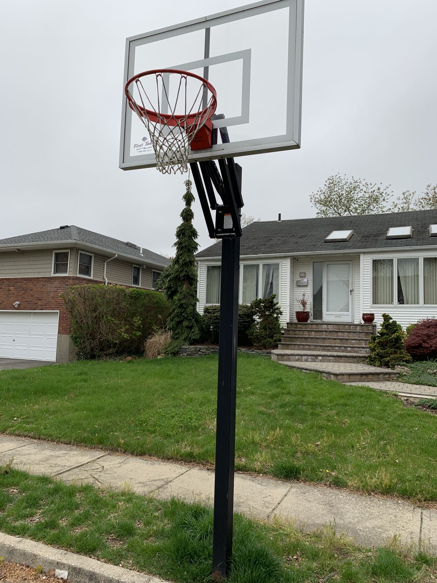 Basketball hoop and post. Like new.