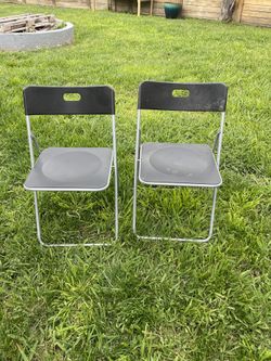 2 Black Folding Chairs