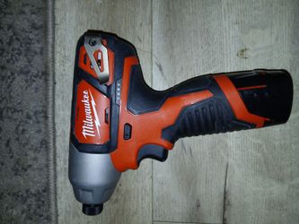 Milwaukee 1/4Hex Impact drill with Red lithium CP1.5