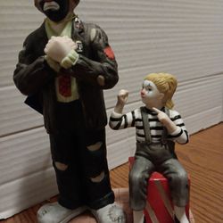 Emmett kelly porcelain statue with girl sitting on box $30