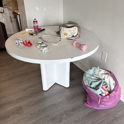 Large white round table