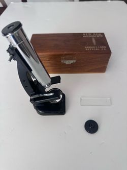 Vintage Bausch & Lomb “New Gem” Microscope with original wooden box.