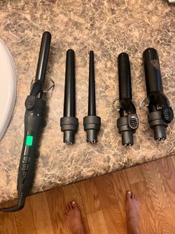 Xtava 5-in-1 Curling Iron & Wands; all 5 attachments work great. Heat is 350-410 degrees. Auto shut-off