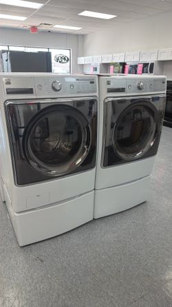 Used kenmore elite front load washer and dryer set. 1 year limited warranty