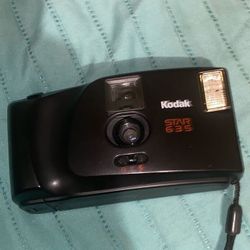 Kodak Star 635 is a vintage 35mm film point-and-shoot camera introduced in the early 1990s,