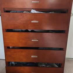 Full size bed set and dresser/chest of drawers.