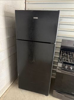 Black Hotpoint Refrigerator And Freezer