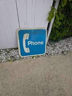 2 vintage phone signs