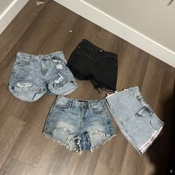 bundle of 3 pairs of shorts with one mini skirt 