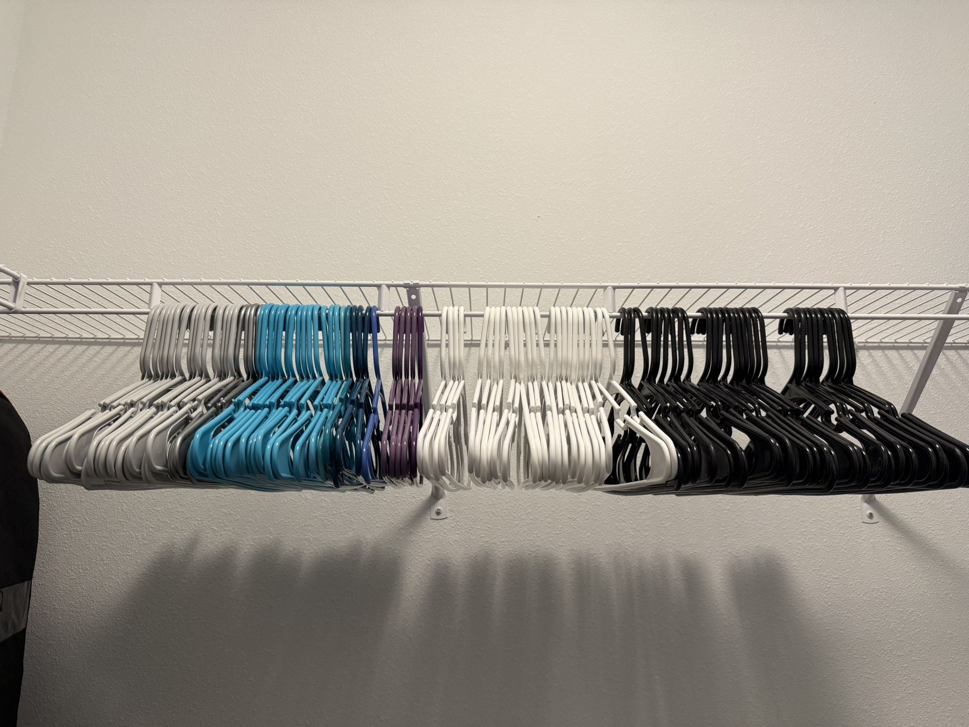 Multi colored plastic clothes hangers