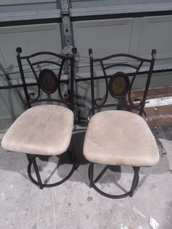 2 Swivel Chairs Used And Good Cond