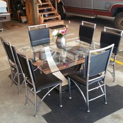 5x5 Glass Dining table and 6 chairs.