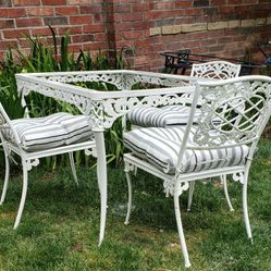Ornate Metal Rectangular Patio Table 53"×35"  3 Chairs With Cushions Glass Top