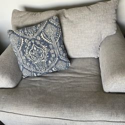 Sofa And Chair With Decorative Pillows