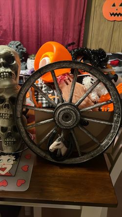 Nice wagon wheel with a horse on it great for any western theme