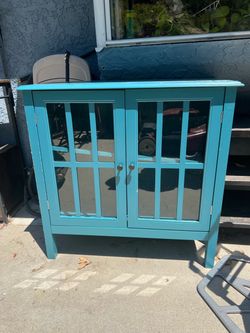 Teal Blue Wood Cabinet with Glass Doors