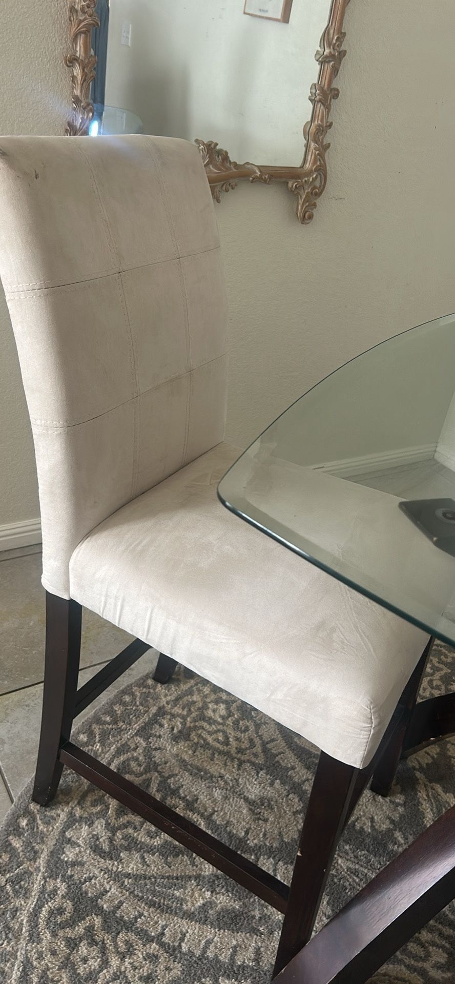 Tall Table With Glass And 2 Beige Barstools