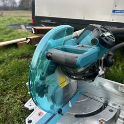 15-Amp 12 in. Dual-Bevel Sliding Compound Miter Saw with Laser and Portable Rise Miter Saw Stand