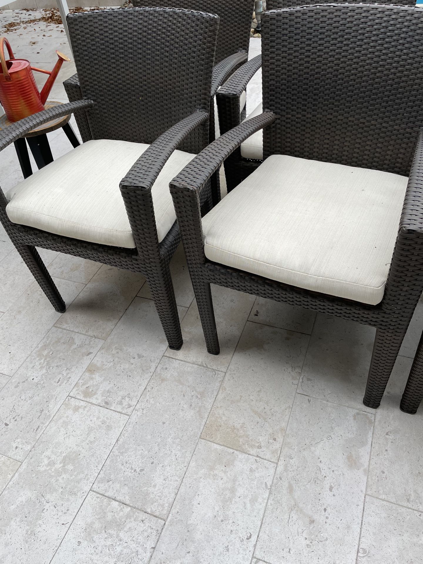 Dedon Outdoor Chairs $100 Each, Potted Plant $40