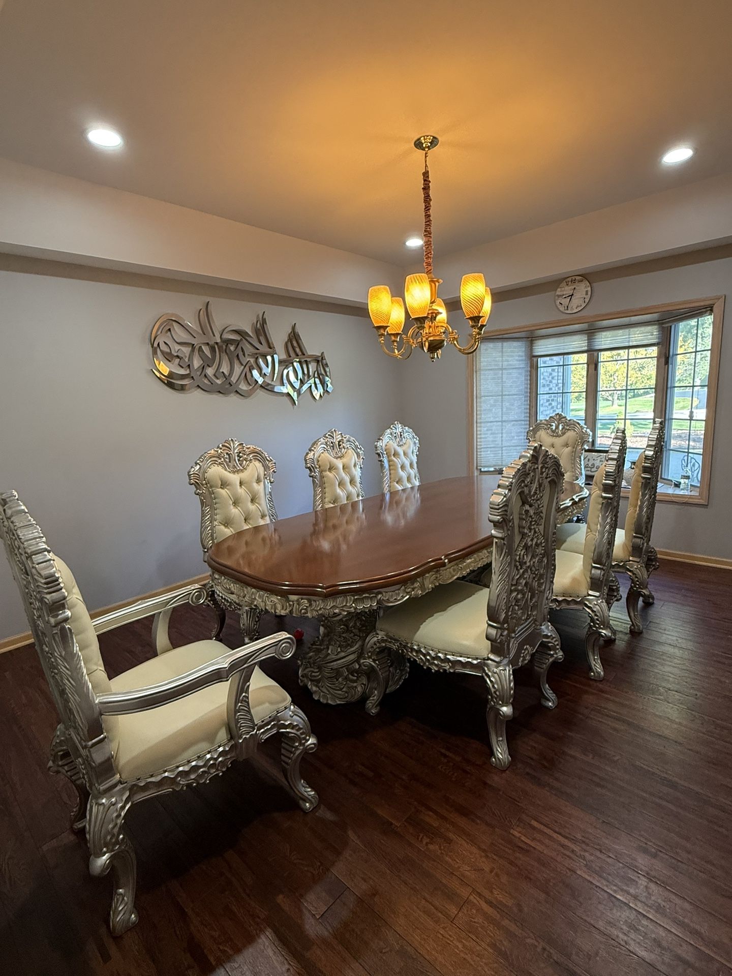 Elegant Dining Table with 8 Chairs – $5000
