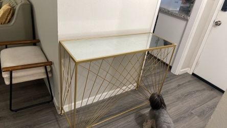 Gold mirror console table.
