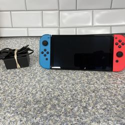 OLED Nintendo Switch 128 gb without docking station no offers or trades please!!!