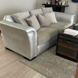 Silver and gray couch 
