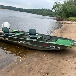 2007 Alumacraft Jon Boat w/25 HP Johnson Motor 