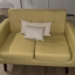 Yellow loveseat 