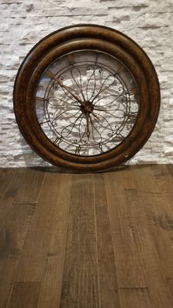Non functional 4 ft round wall clock .heavy.$40