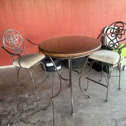 Wrought Iron Table And Chairs 