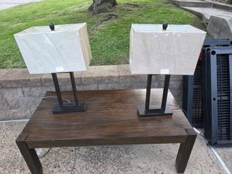 Two black metal lamps