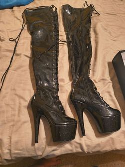 Ador thigh high leather stilettos size 10 I wear a 9 in regular shoes but bought the 10 in these cause the felt better