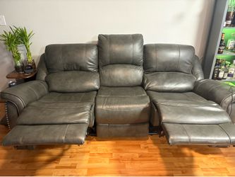 Grey reclining clean couches powered with charging ports. Best Realistic offers accepted .