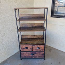 Very nice lightweight shelf. Easy to move with 1 large drawer and 2 small drawers. I'm asking $10.00
