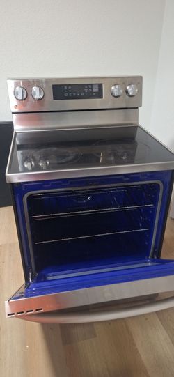 Estufa electrica lg probake convection inteligente  de 6.3 cubicos con WiFi,freidora de aire  y easy clean