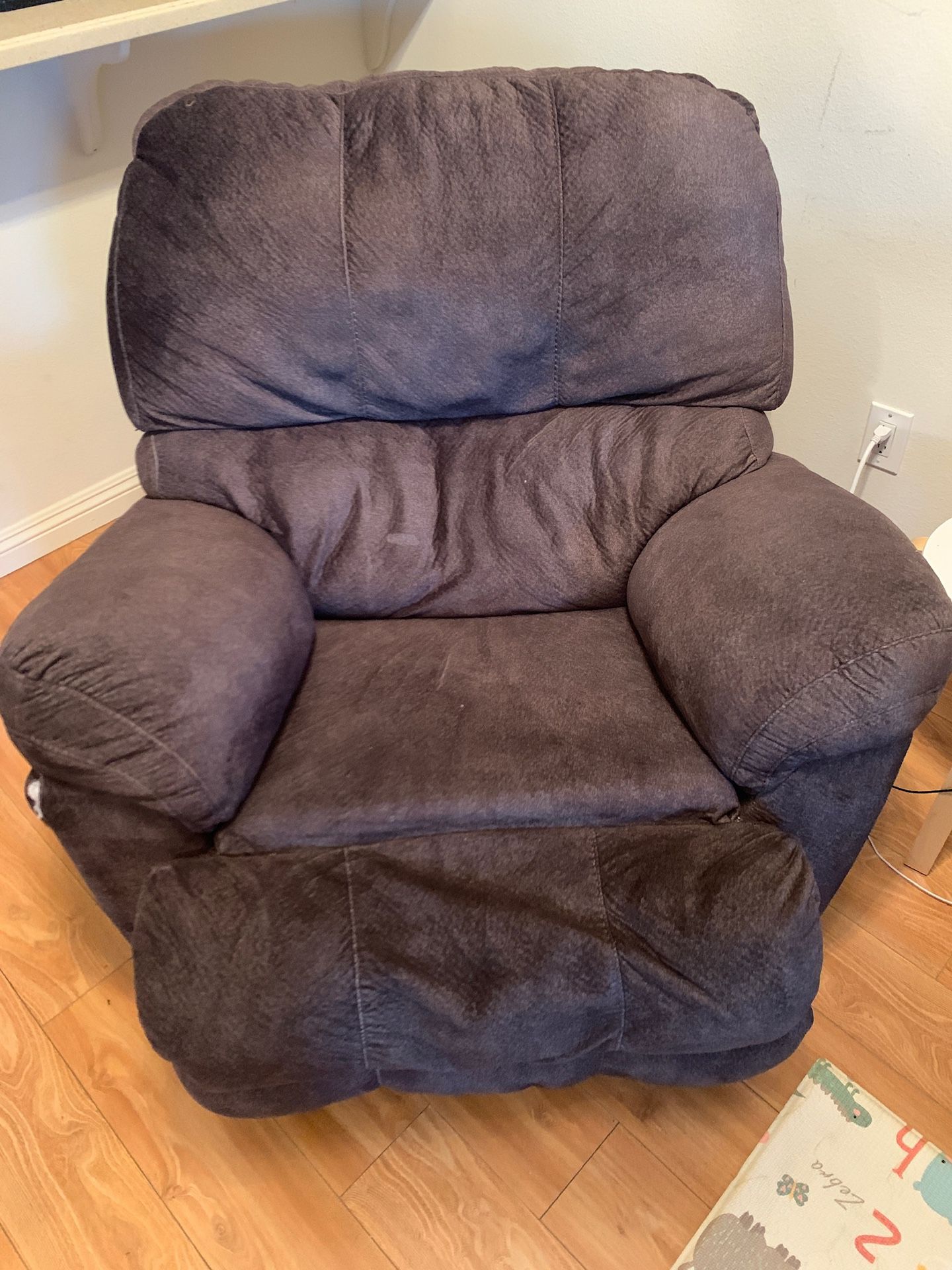 Recliner. Has a small tear in corner. Needs to be sold by the end of the month. Pick up after Nov.28