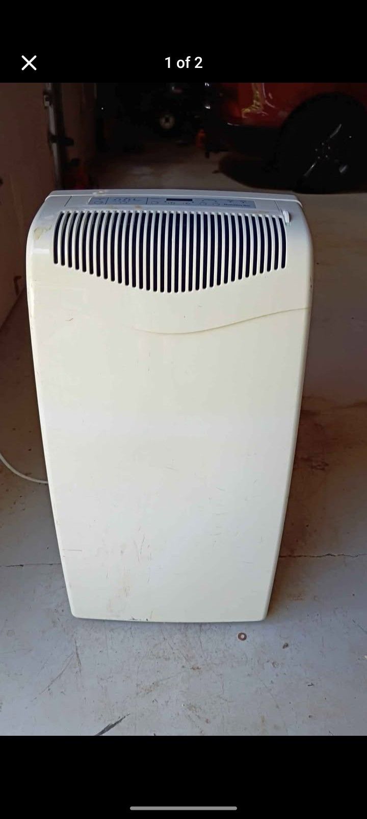 Free standing AC unit and dehumidifier built in 7000 BTU Hampton Bay needs rear hose leaks water