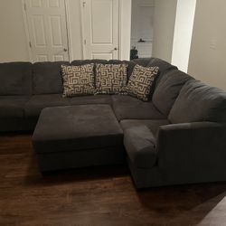 Large Charcoal Gray Sectional With Oversized Ottoman