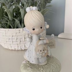 Precious Moments July porcelain figurine