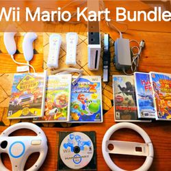 Wii Mario Kart Bundle. 2 Racing Wheels, Console, 2 Controllers,  2 Nunchucks, Mario Galaxy 2, Game Lot 