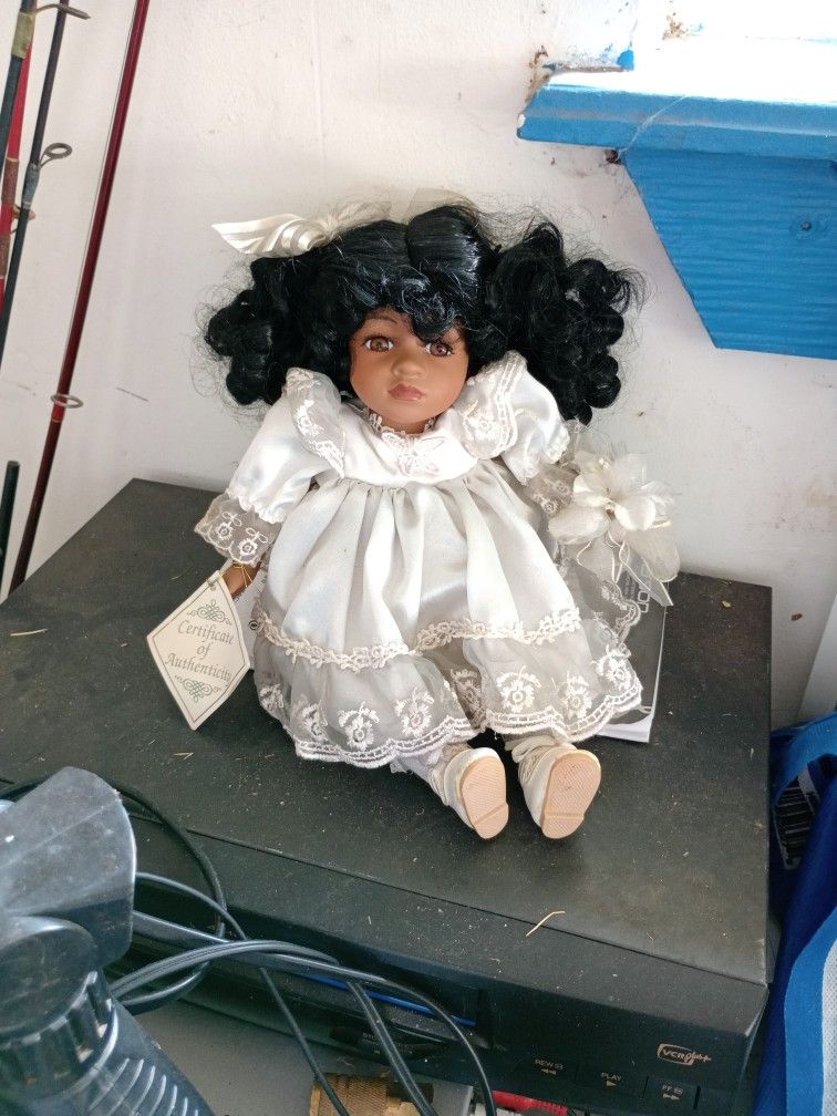 Porcelain Doll That Plays Music