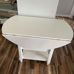 Round White Fold Out Table