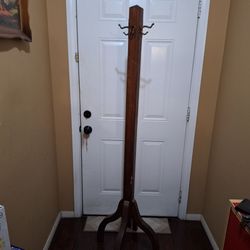 Wooden Standing Coat Rack / Hall Tree – Brass-Tone Hooks
Description:
Wooden standing coat rack/hall tree with 3 brass-tone hooks. Missing one hook.