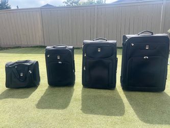 Travelpro Crew 4-Piece Expandable Luggage Set (Tote, Carry-On, & 2 Checked Bags)