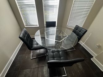 Glass top table and chairs with matching coffee table
