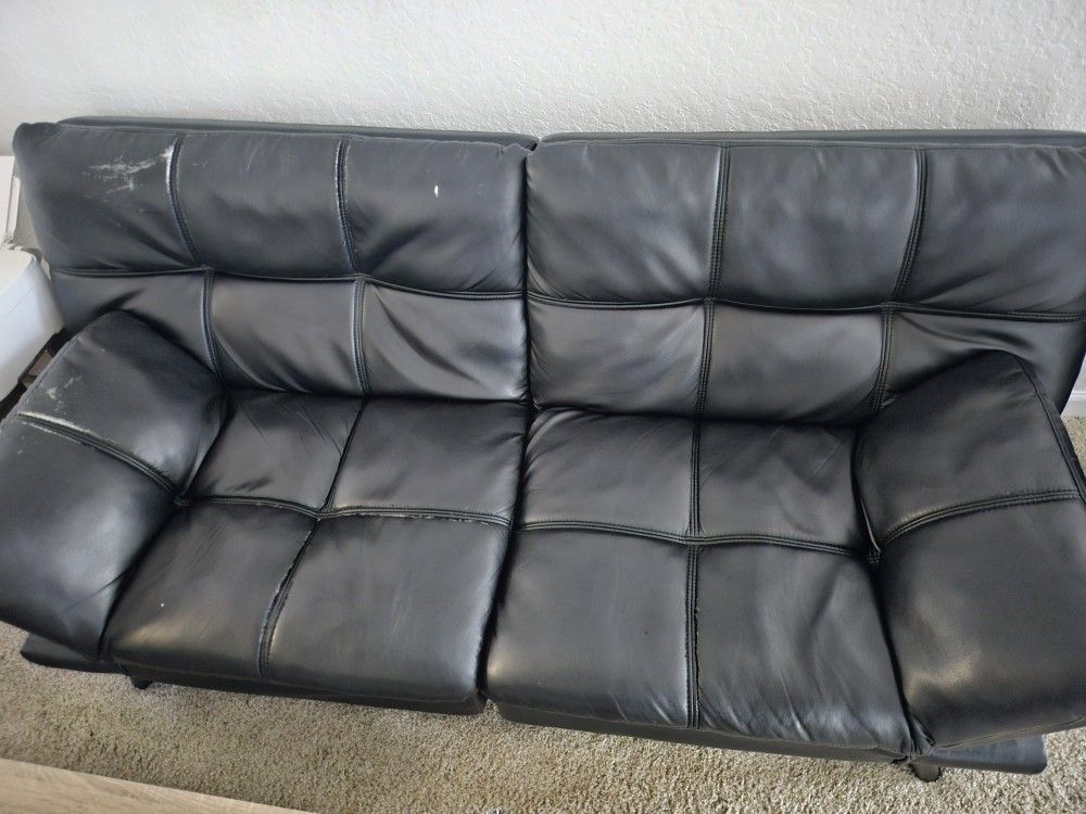Faux Leather Couch - Can fold out into twin bed