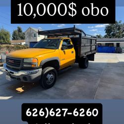2003 GMC Dump Truck & 05 Ram 2500