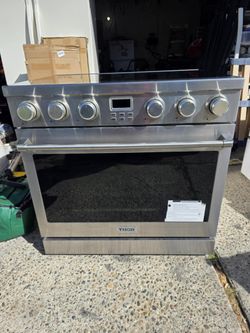Brand New 36 in  5 Burner, Free standing Electric Range, Stainless Steel with Convection oven.