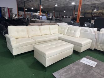 Brand new sectional sofa with ottoman.